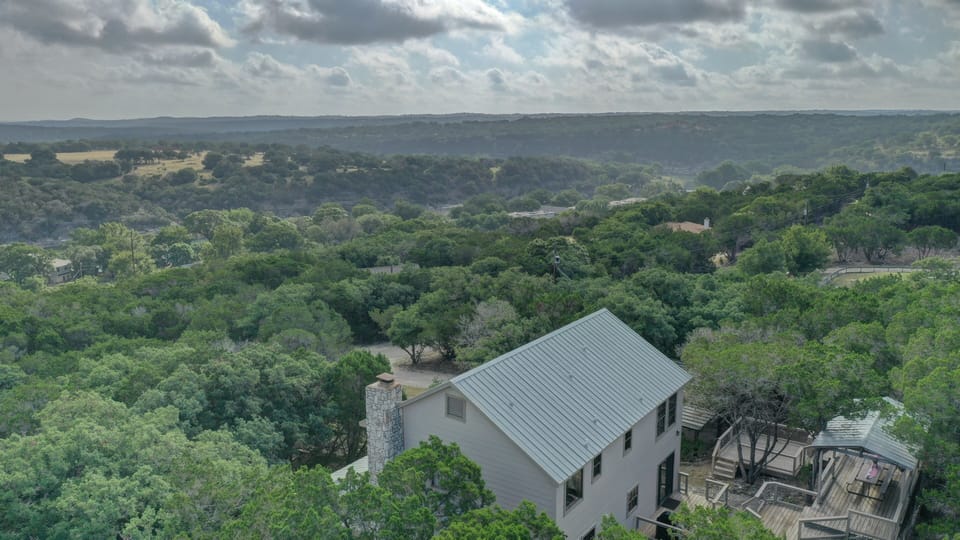 Home sits high on a hilltop with excellent scenic views