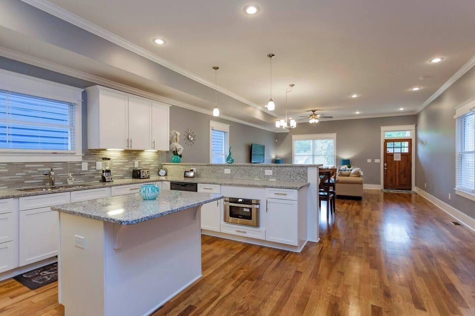 Granite countertops and a loaded kitchen for cooking