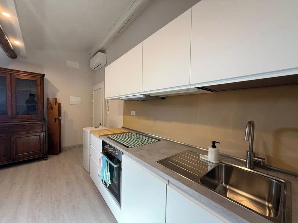 Kitchen, Countertop, Kitchen Appliance, Major Appliance, Flooring, Interior Design, Cabinetry, Wood, Floor, Kitchen Sink