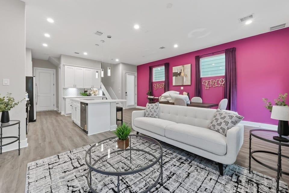 Living Room: Vibrant hues and modern decor create a perfect gathering space for unforgettable moments!