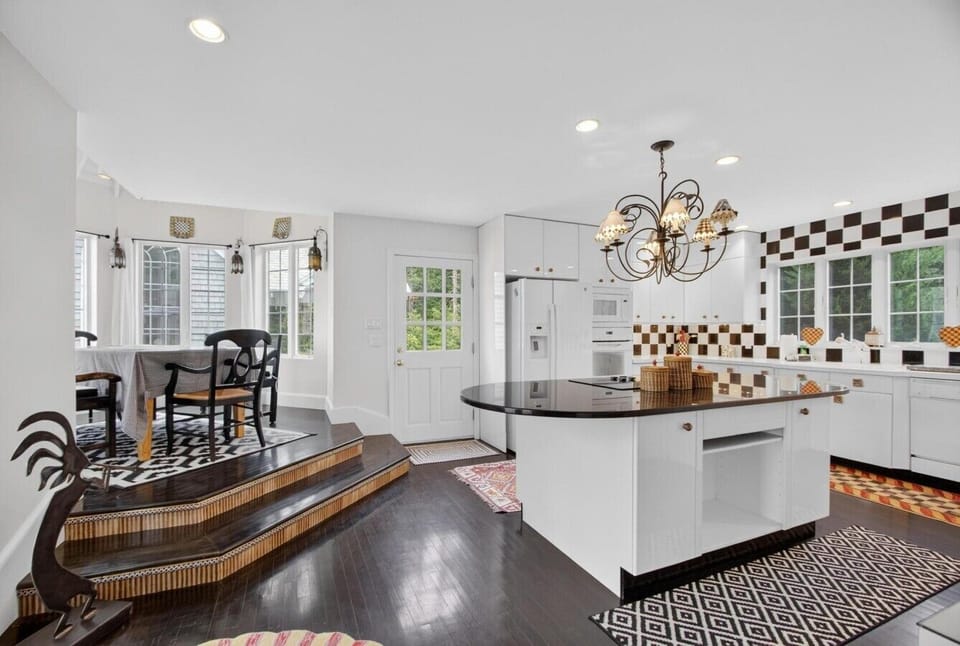 Hop up a couple of steps to the adorable breakfast nook in the kitchen