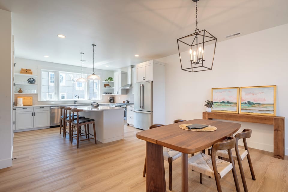 Dining area with kitchen views
