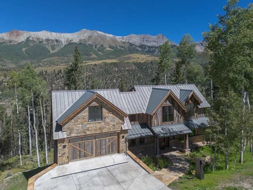 Exterior view with the mountains in the background.
