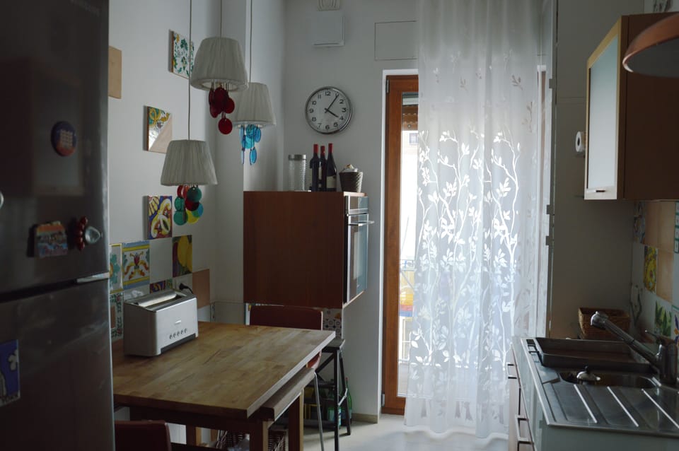 Kitchen, high table and stools.