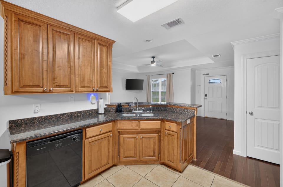 Well-equipped kitchen with ample space for cooking and gathering.