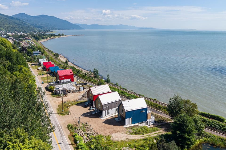 Where colorful shores meet the endless St. Lawrence blue.