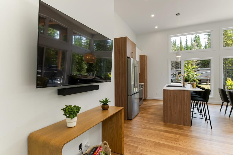 Movie nights flow easily from the kitchen to the screen.