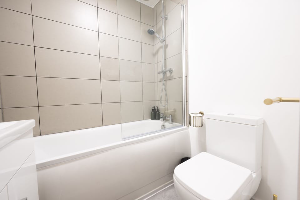 Bathroom with bath, walk-in shower and WC