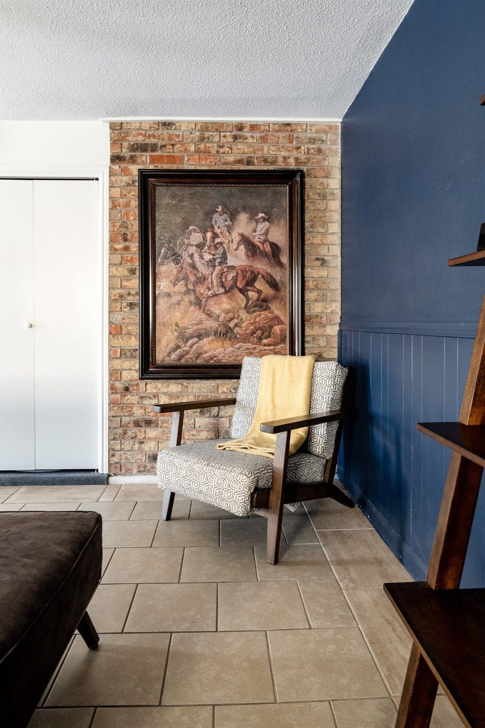 Warm textures and a cozy chair—perfect for reading or unwinding.