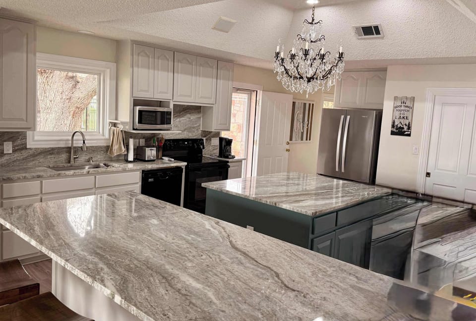 Fully equipped kitchen with space to gather, cook, and connect