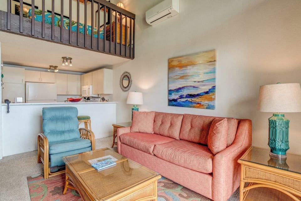 Greet each morning with floor-to-ceiling ocean views, plush seating, and the gentle rhythm of waves beyond.     NAP-C42