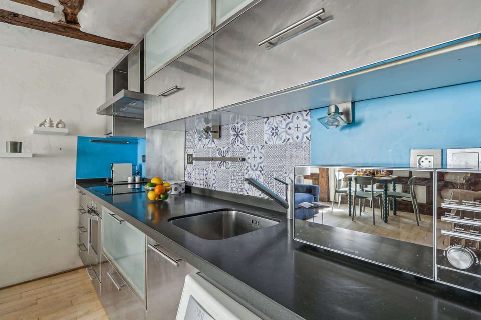 The kitchen is fully equipped to prepare a simple meal 