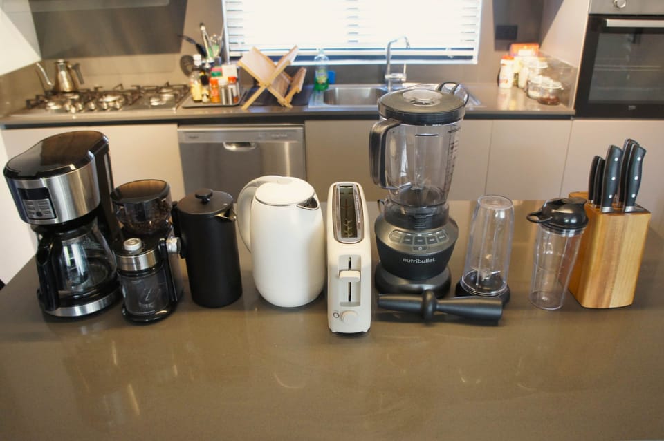 Appliances: coffee maker, grinder, toaster, blender, french press, HENKELS knives...