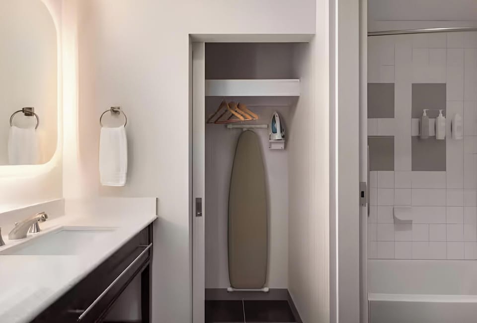 Refresh easily in a bright, spotless bath with storage.