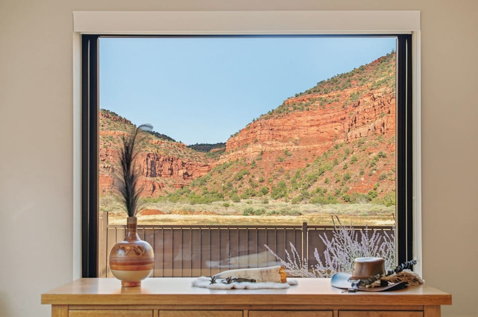 Wake up to stunning red rock canyon views right from your window at Grand Kanab'n, Kanab.
