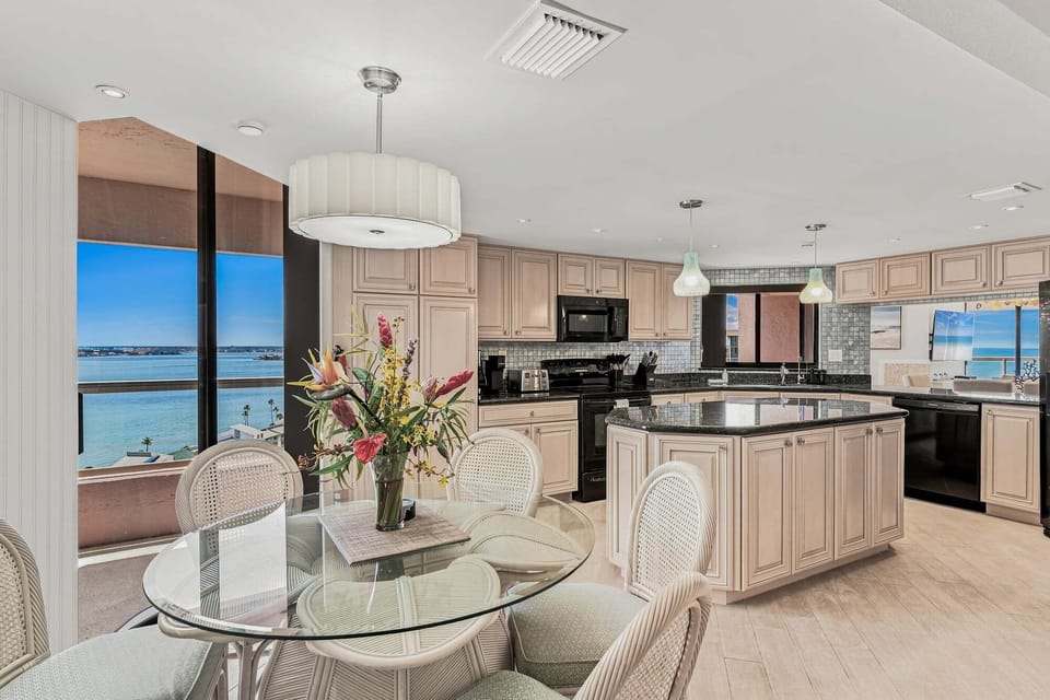 Large, newly updated kitchen and breakfast nook with balcony access.