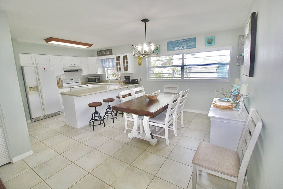 ’the large kitchen/Dining Room space of Seaside Serenity.