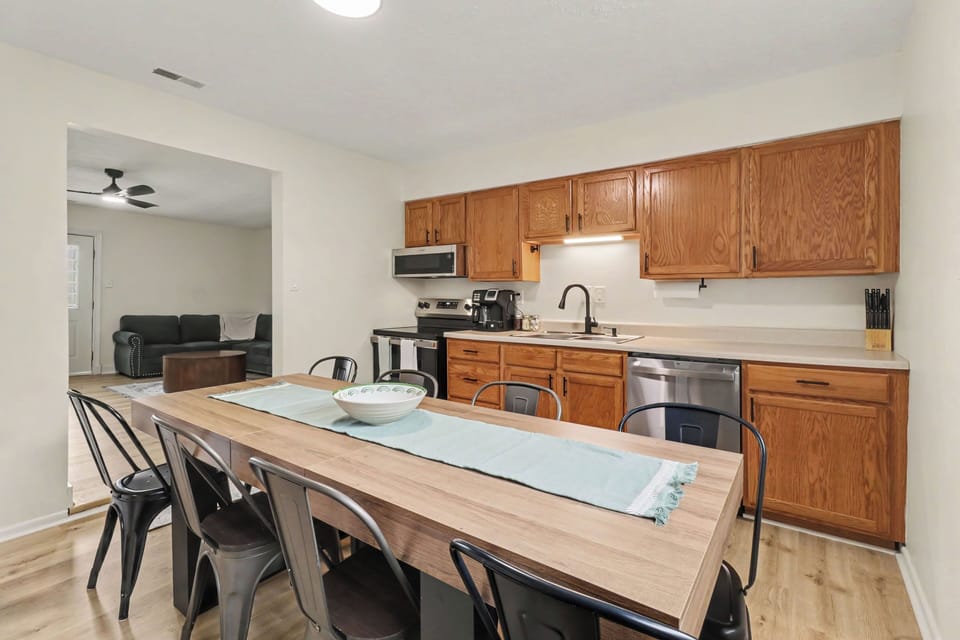 Fully equipped kitchen with full-size appliances, cookware and dishware 