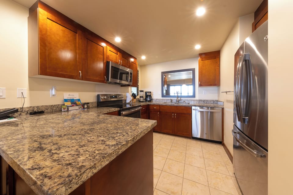 Prep fresh favorites on expansive counters under bright lighting.