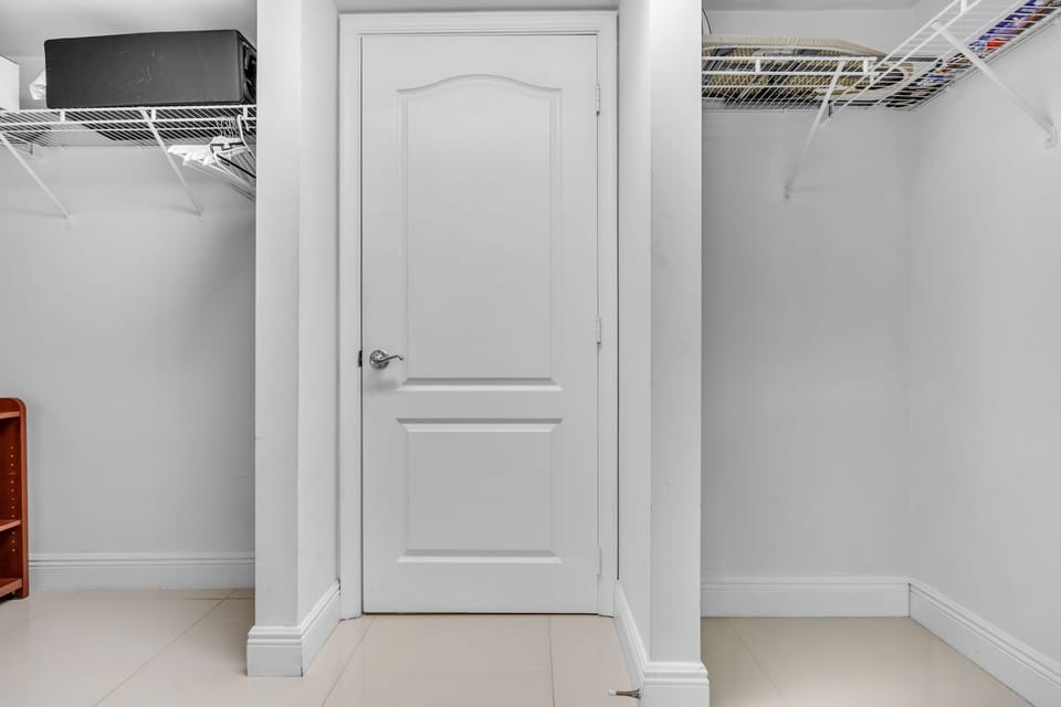 Keep clothes & bags tucked away in the walk-in closet​