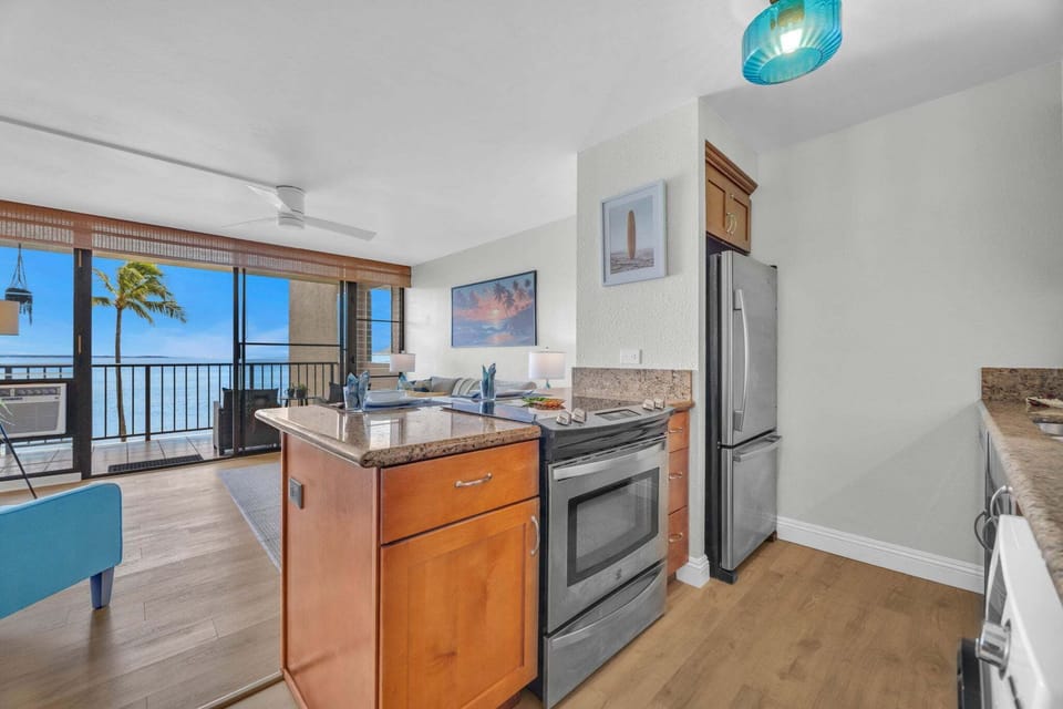 Full kitchen with stainless steel appliances and granite countertops 
Plus "what a view"