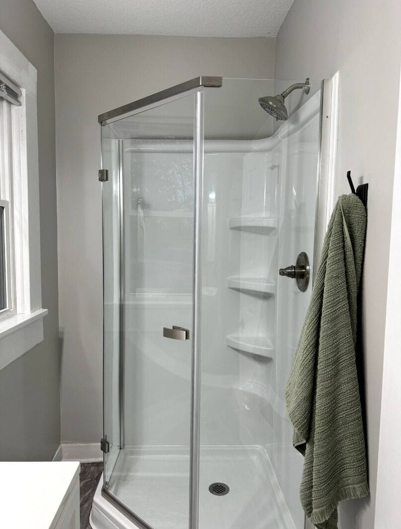 Rinse off in a sleek, spacious glass shower after a full day of exploring.