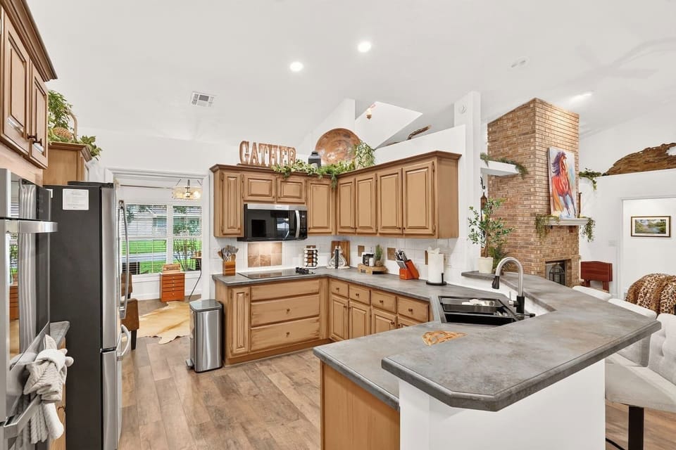 Plenty of counter space to spread out and open concept for the whole group to stay connected.