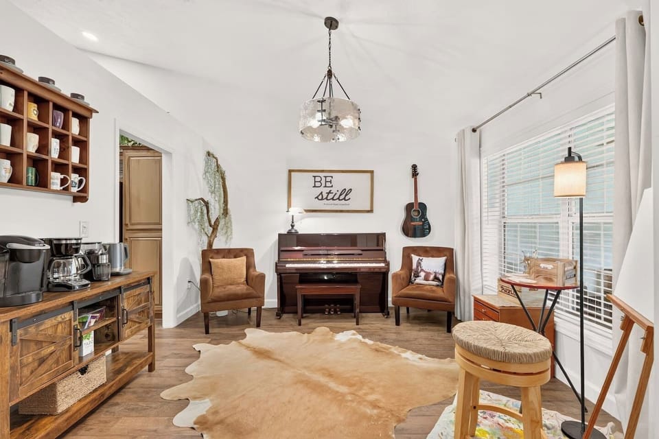 Although music studio does not fully describe this space,, we have provided this amazing creative space with a piano, guitar, and art easel.  We hope you will enjoy this space and ask that you please use these items with care.