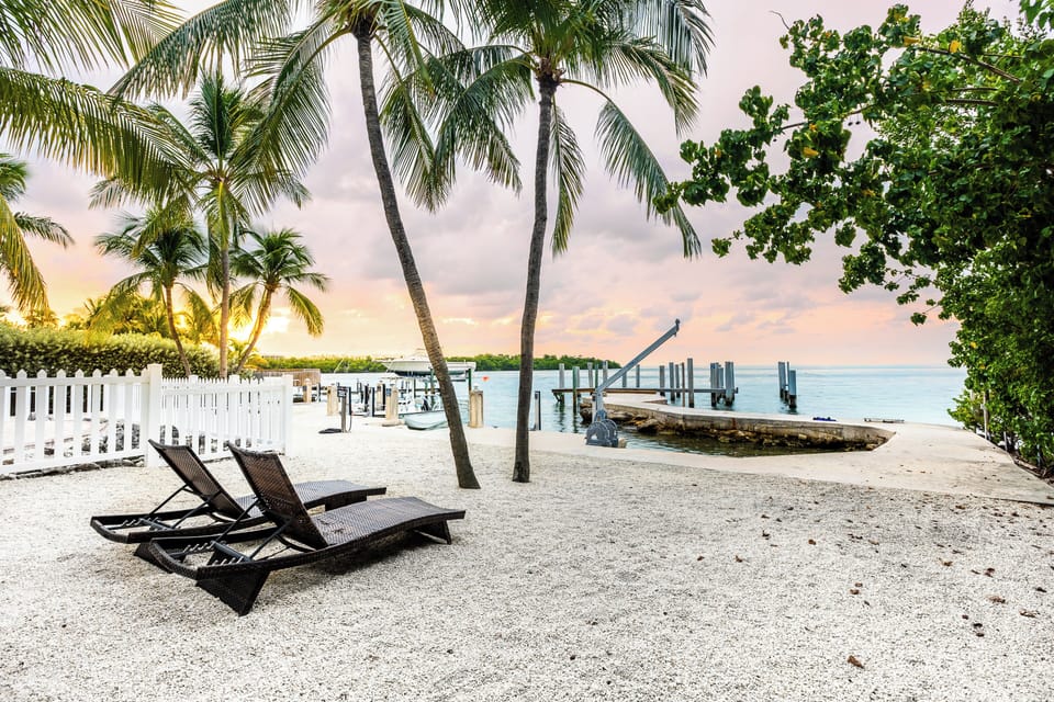 Take in breathtaking sunset views from the dock, where the sea stretches endlessly toward the horizon.