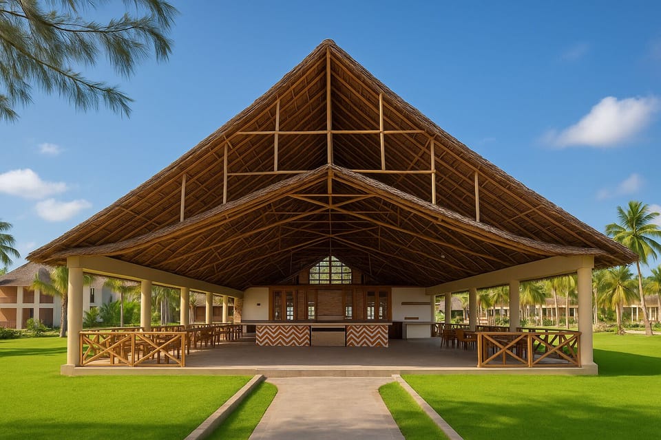 Arrive to breezy open-air pavilion, framed by tropical lawns.