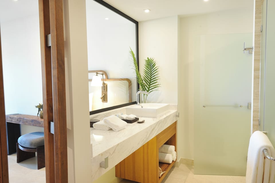 Refresh after adventures in a bright spa-like marble vanity.