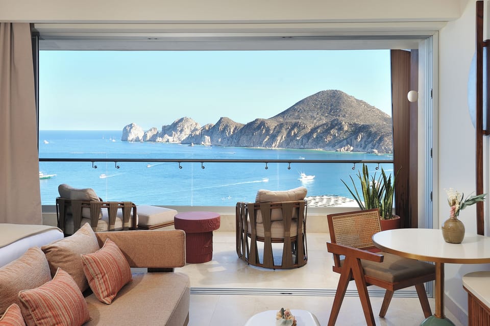 Unwind on the sofa while the sea sparkles outside.