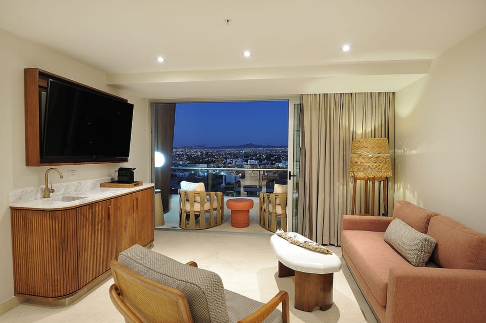 Settle in with cocktails as the city lights glow.