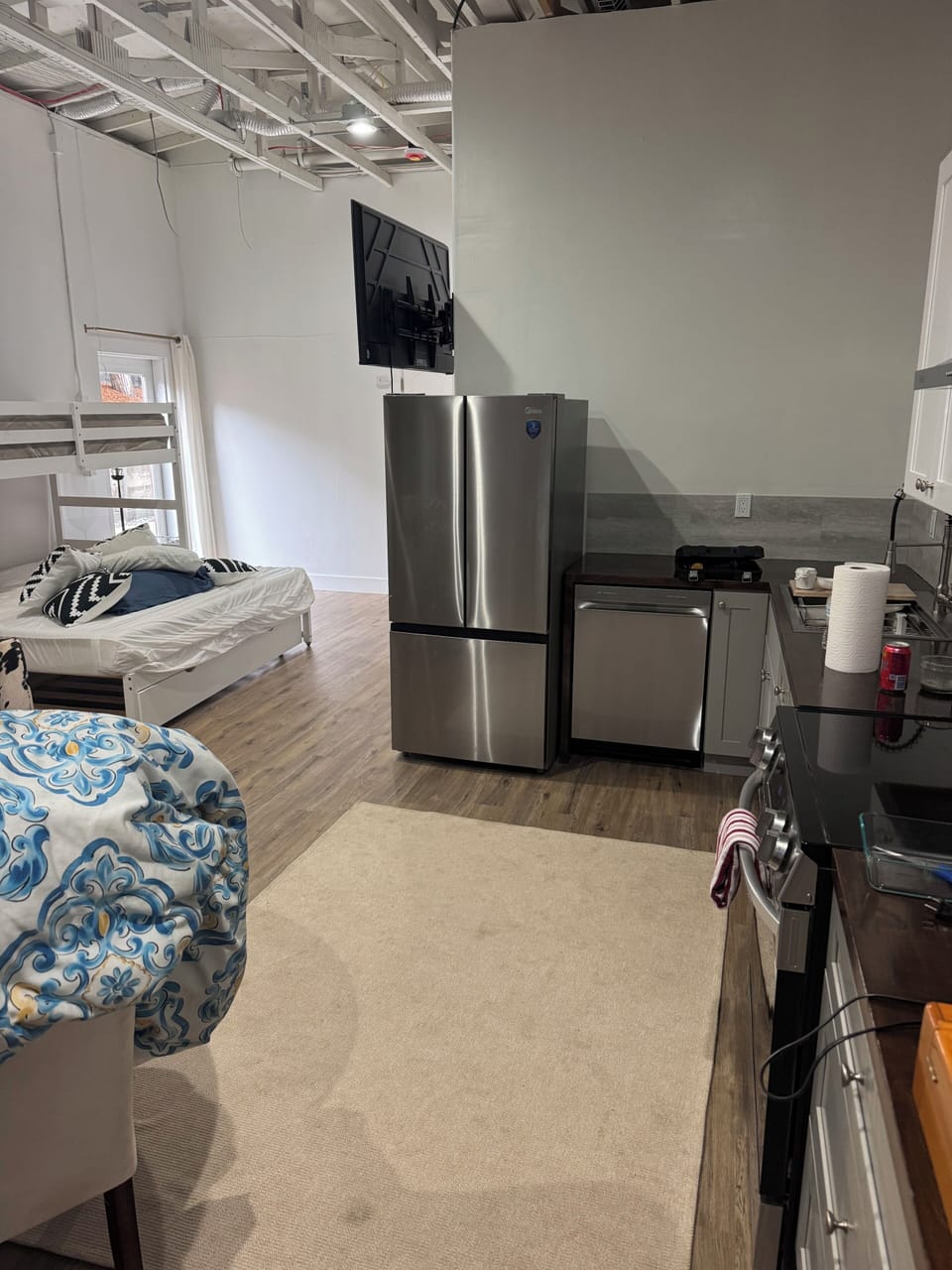 Tv swivels to view from sofa and kitchen or bed