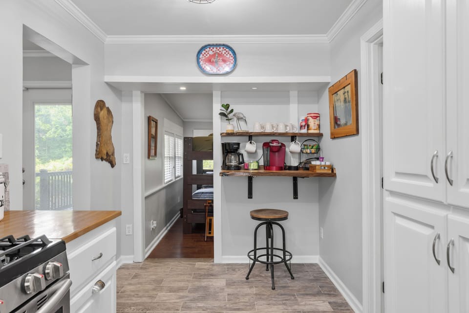 Bright kitchen with cozy coffee bar and family-friendly bunk room access