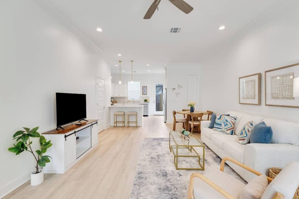 View of living room and kitchen from the front door