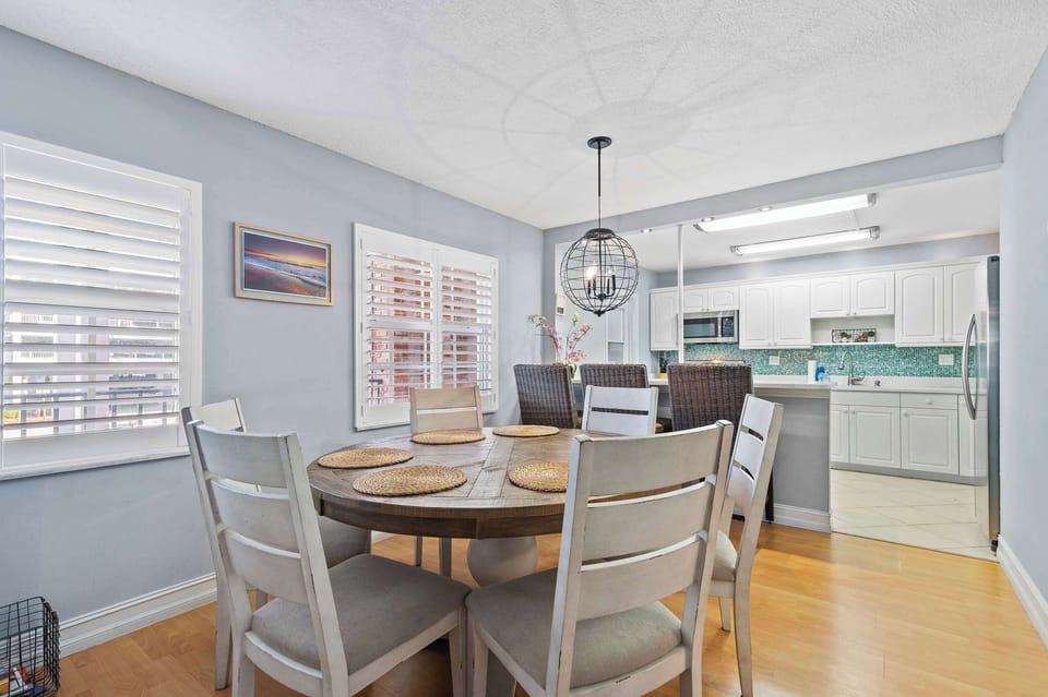 Gather around the dining table with seating for up to six guests.