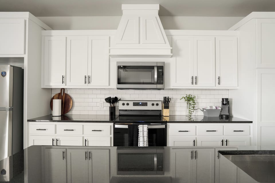Bright modern kitchen with sleek finishes and spacious island