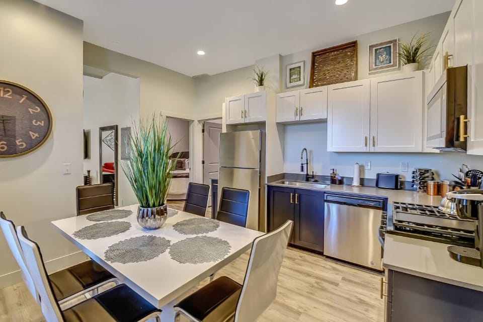 Full kitchen with all of the cooking essentials. Dining table seats 6.