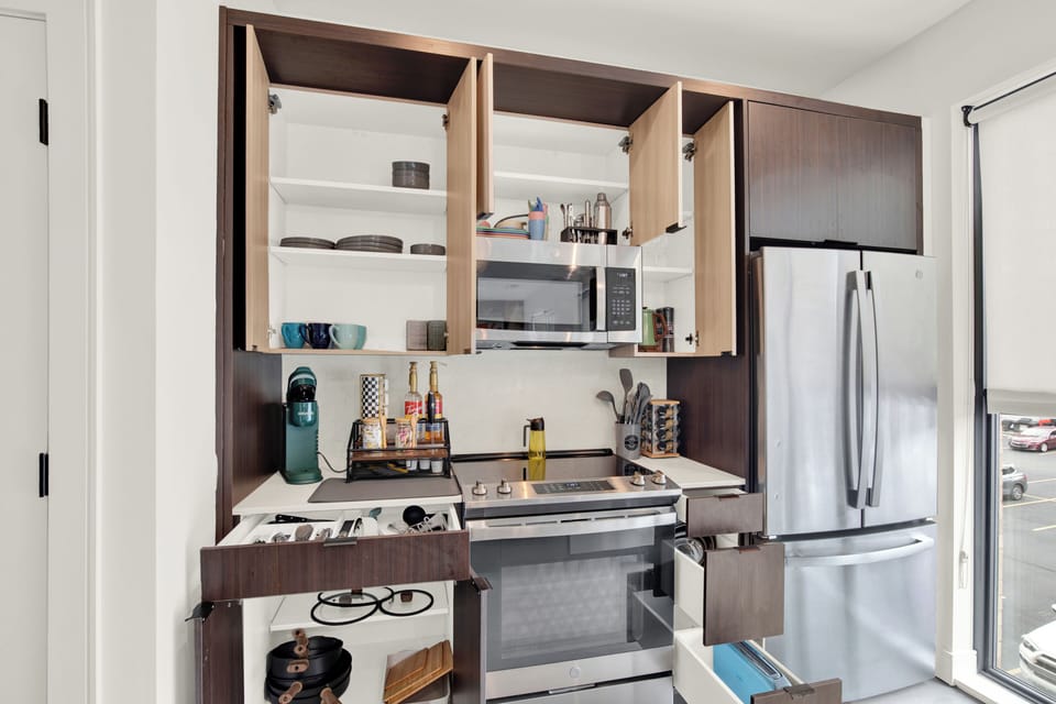 Modern kitchen with smart storage and sleek stainless steel appliances