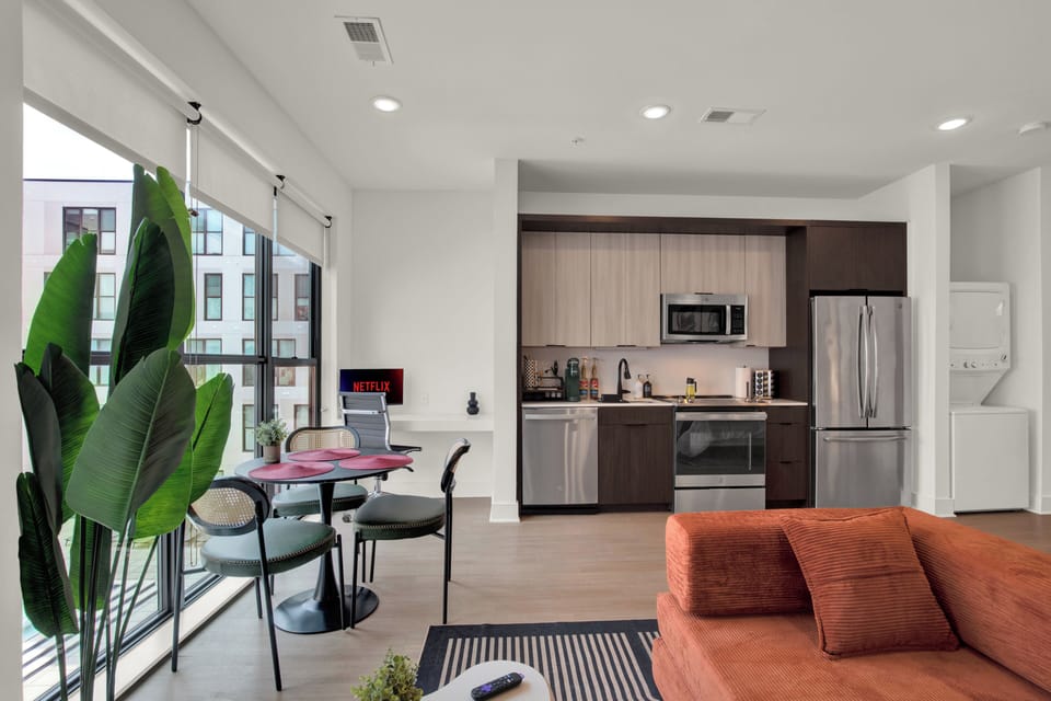 Bright modern apartment with city views, full kitchen, and in-unit laundry