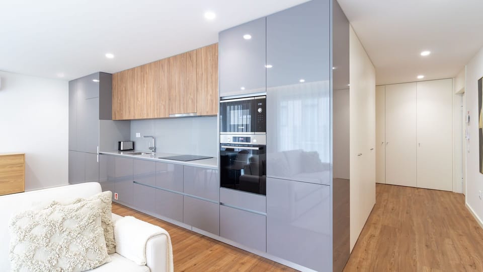 Experience seamless open-plan living where the sophisticated kitchen flows effortlessly into a comfortable lounge area, perfect for entertaining or relaxing. Enjoy the convenience of modern appliances and a well-designed space that maximizes comfort and s