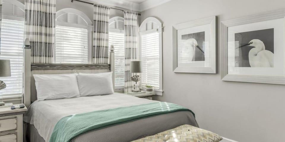 Primary Bedroom 4 with King Bed and Side Views of Gulf