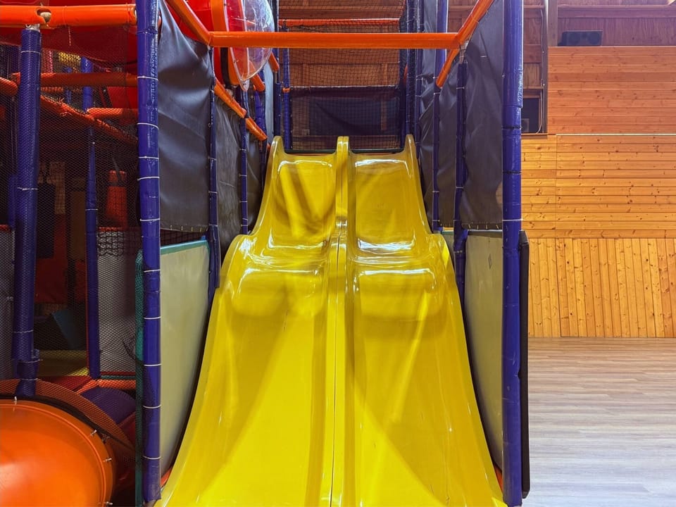 Double the excitement at the Activity Arena with side-by-side slides!