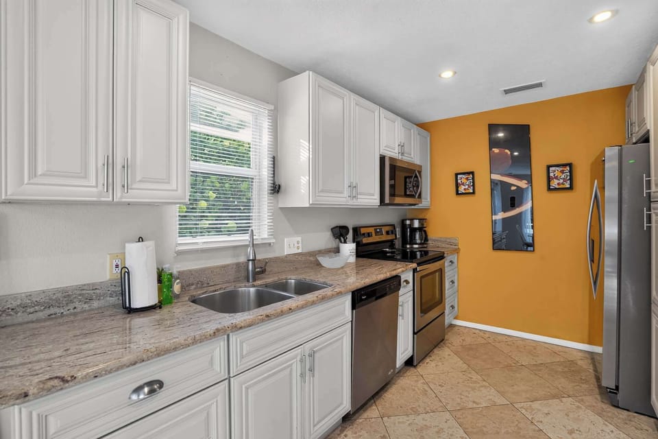 A kitchen designed for cooking, gathering, and entertaining.