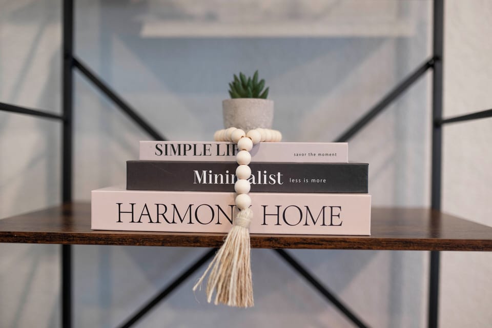 Curated shelf styling with neutral tones and calming minimal decor
