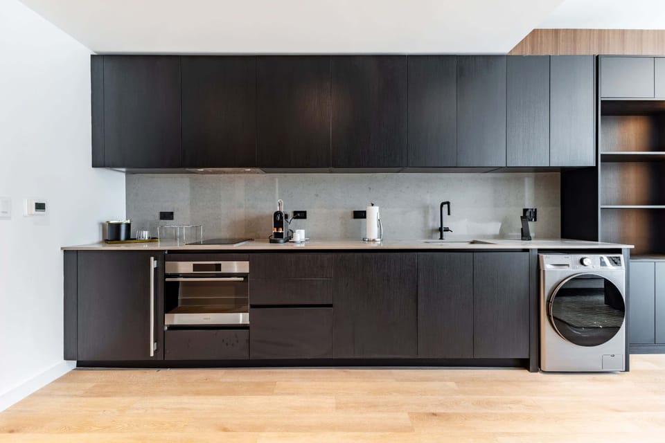 The sleek, open kitchen is well equipped for an unforgettable getaway​