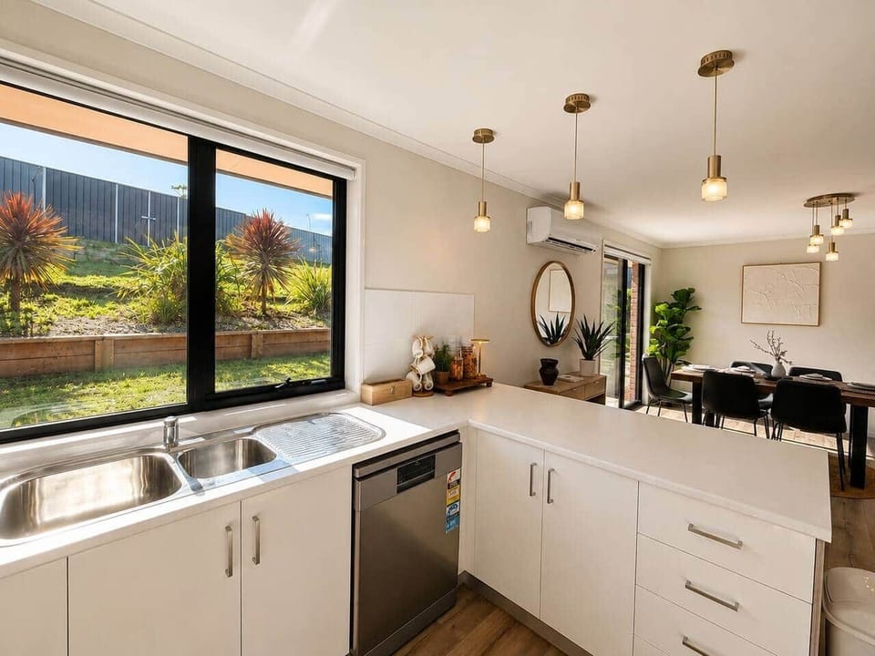 Modern fully equipped kitchen ideal for family meals and extended stays.