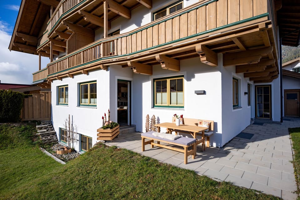 Kirchberg in Tirol vacation rental with patio by the house, outdoor seating and a peaceful base for families, relaxing stays and Alpine adventures.