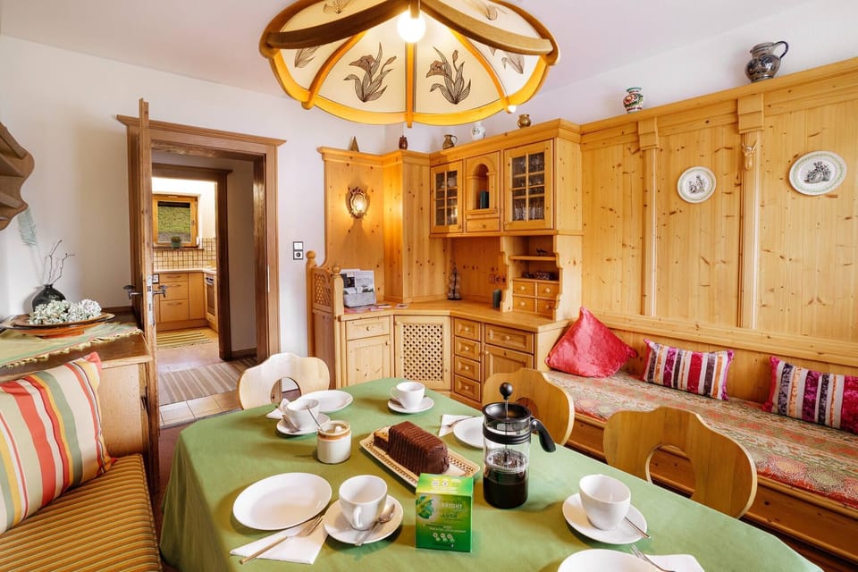 Book a Kirchberg vacation home with rustic common room, tiled stove and plenty of space for families, friends and groups.